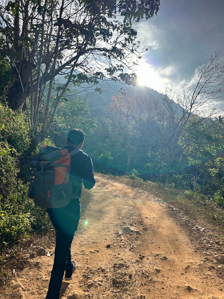 Shajan walking to forest station in the morning